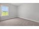 Bedroom featuring a view of the outside, neutral walls and carpeted floor at 5009 Shore Breeze Dr., Myrtle Beach, SC 29588