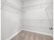 Walk-in closet with wire shelving and carpeted floor at 5009 Shore Breeze Dr., Myrtle Beach, SC 29588