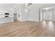 Open concept home with beautiful hardwood flooring and seamless flow between living and kitchen at 5009 Shore Breeze Dr., Myrtle Beach, SC 29588