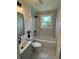 Newly renovated bathroom featuring marble tile, updated fixtures and vanity sink at 518 Nowell St., Georgetown, SC 29440
