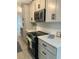 Modern kitchen featuring stainless steel appliances, quartz countertops, and stylish cabinets at 518 Nowell St., Georgetown, SC 29440