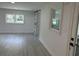 Bright living room with natural light and a sliding glass door leading to the outside at 518 Nowell St., Georgetown, SC 29440