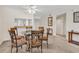 Inviting dining area with a glass-top table and seating for six at 5515 N Ocean Blvd. # 209, Myrtle Beach, SC 29577