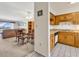 View of an open concept floorplan including the kitchen and dining room at 5515 N Ocean Blvd. # 209, Myrtle Beach, SC 29577
