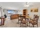 Open-concept living space seamlessly combines the living room and dining area at 5515 N Ocean Blvd. # 209, Myrtle Beach, SC 29577