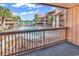Relaxing balcony view showcases the pool and tropical scenery at 5515 N Ocean Blvd. # 209, Myrtle Beach, SC 29577