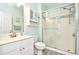 Bright bathroom featuring a glass enclosed shower, white vanity, and coastal decor at 5825 Catalina Dr. # 833, North Myrtle Beach, SC 29582