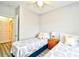Charming bedroom featuring two twin beds, a nightstand, and a welcoming atmosphere at 5825 Catalina Dr. # 833, North Myrtle Beach, SC 29582