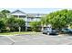 A well-maintained two-story condo with lush greenery, perfect for relaxed living at 5825 Catalina Dr. # 833, North Myrtle Beach, SC 29582