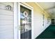 Inviting entryway with stylish door and sidelight, offering a glimpse of the outdoors at 5825 Catalina Dr. # 833, North Myrtle Beach, SC 29582