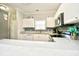 Modern kitchen with stainless appliances, bright cabinets, and a lovely breakfast bar at 5825 Catalina Dr. # 833, North Myrtle Beach, SC 29582