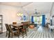 Spacious living and dining area with vaulted ceilings and access to a private balcony at 5825 Catalina Dr. # 833, North Myrtle Beach, SC 29582