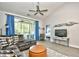 Relaxing living space with comfortable seating, TV, and view into adjacent bedroom at 5825 Catalina Dr. # 833, North Myrtle Beach, SC 29582