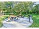 Outdoor picnic area with picnic tables and charcoal grills at 5825 Catalina Dr. # 833, North Myrtle Beach, SC 29582
