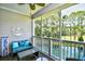 Relaxing screened porch with comfortable seating and scenic golf course views at 5825 Catalina Dr. # 833, North Myrtle Beach, SC 29582