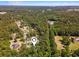 Aerial view of the property showcasing its location within the Sunset Beach area at 589 Boundaryline Dr. Nw, Calabash, NC 28467