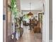 View into the dining area with hardwood floors, and stylish furnishings at 589 Boundaryline Dr. Nw, Calabash, NC 28467