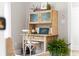 Cozy home office nook featuring a vintage desk, chair, and stylish accents at 589 Boundaryline Dr. Nw, Calabash, NC 28467