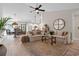 An open-concept living room features hardwood floors and natural light at 589 Boundaryline Dr. Nw, Calabash, NC 28467