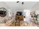 Cozy living room with hardwood floors, comfortable seating, and modern entertainment center at 589 Boundaryline Dr. Nw, Calabash, NC 28467