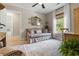 Relaxing sitting room with a comfortable sofa, natural light, and elegant decor at 589 Boundaryline Dr. Nw, Calabash, NC 28467