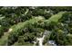 Aerial view of a lush green golf course winding through a residential neighborhood at 59 Bay Tree Ln., Pawleys Island, SC 29585