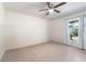 Clean and bright bedroom with a ceiling fan, natural light and neutral carpet at 59 Bay Tree Ln., Pawleys Island, SC 29585