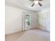 Bright bedroom featuring a ceiling fan, neutral carpet and window with natural light at 59 Bay Tree Ln., Pawleys Island, SC 29585