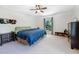 Bright bedroom featuring a ceiling fan, window with natural light and neutral carpet at 59 Bay Tree Ln., Pawleys Island, SC 29585