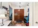 Welcoming entryway with tiled floor, a double-door entry, and ample storage at 59 Bay Tree Ln., Pawleys Island, SC 29585
