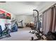 Home gym filled with workout equipment and neutral carpet at 59 Bay Tree Ln., Pawleys Island, SC 29585