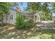 Inviting single-story home with brick foundation, charming shutters, and well-maintained landscaping at 602 3Rd Ave. N, Myrtle Beach, SC 29577