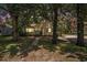 Charming cottage-style home nestled among mature trees and landscape at 602 3Rd Ave. N, Myrtle Beach, SC 29577