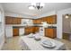 Functional kitchen featuring wooden cabinets and ample countertop space for food preparation at 602 3Rd Ave. N, Myrtle Beach, SC 29577