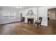 Spacious living room featuring hardwood floors, a fireplace, and ample natural light at 602 3Rd Ave. N, Myrtle Beach, SC 29577
