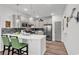 Modern kitchen with stainless steel appliances, white cabinets, and a stylish backsplash at 6029 Campanella St., Myrtle Beach, SC 29572