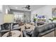 Inviting living room with modern decor, comfortable seating, and a ceiling fan at 6029 Campanella St., Myrtle Beach, SC 29572