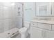 Stylish bathroom with marble countertop vanity and a tiled shower with glass door at 607 Boone Hall Dr., Myrtle Beach, SC 29579