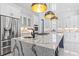 Bright kitchen with white cabinets, granite counters, and a view of the chef's island at 607 Boone Hall Dr., Myrtle Beach, SC 29579