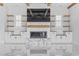 Close-up of fireplace with white cabinets and shelves in a modern living room at 607 Boone Hall Dr., Myrtle Beach, SC 29579