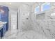 Elegant shower with marble throughout, rain shower head and glass door at 607 Boone Hall Dr., Myrtle Beach, SC 29579