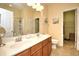 Spacious bathroom featuring double sinks and a glass-enclosed shower at 6172 Catalina Dr. # 113, North Myrtle Beach, SC 29582