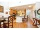Bright kitchen features light wood cabinetry, breakfast bar, and stainless steel appliances at 6172 Catalina Dr. # 113, North Myrtle Beach, SC 29582