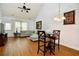 Spacious living room with a high ceiling, comfortable seating, and modern decor at 6172 Catalina Dr. # 113, North Myrtle Beach, SC 29582