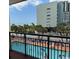 Balcony view of the sparkling pool and ocean waters at 6900 Ocean Blvd. N # 303, Myrtle Beach, SC 29572