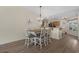 Dining area features a wooden table with seating for six next to the breakfast bar at 729 Bonita Loop, Myrtle Beach, SC 29588