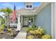 A welcoming front porch with tasteful decor and a view of the landscaped yard at 729 Bonita Loop, Myrtle Beach, SC 29588
