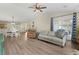 The spacious living room features wood floors and access to both the kitchen and the backyard at 729 Bonita Loop, Myrtle Beach, SC 29588