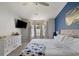 Bright main bedroom with an accent wall, a ceiling fan, and a large window at 729 Bonita Loop, Myrtle Beach, SC 29588