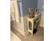 Stylish bathroom features a charming side table with decorative accents and ample storage at 814 James Landing Ct., Murrells Inlet, SC 29576